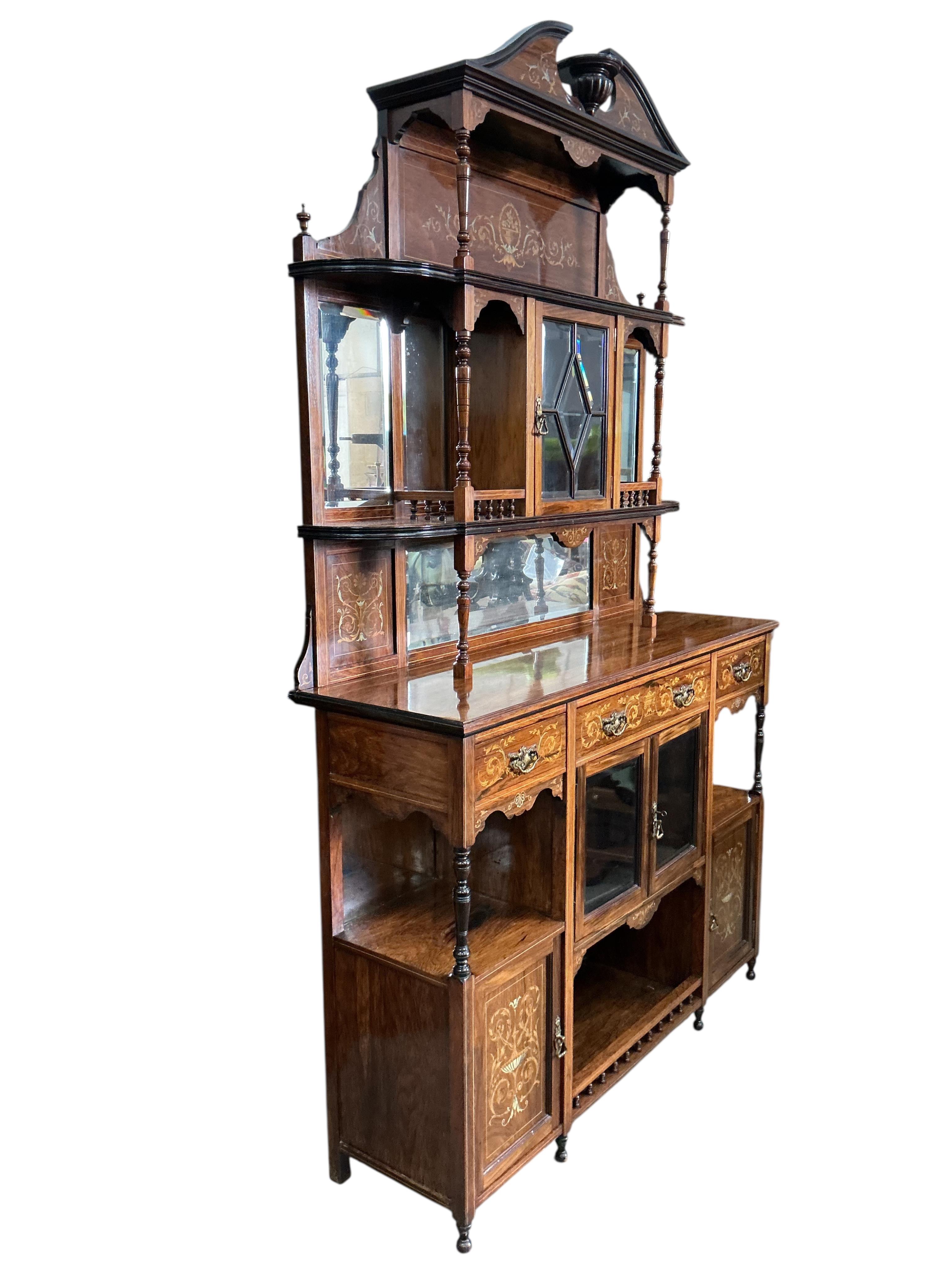 A late Victorian marquetry inlaid rosewood side cabinet, width 138cm, depth 42cm, height 228cm